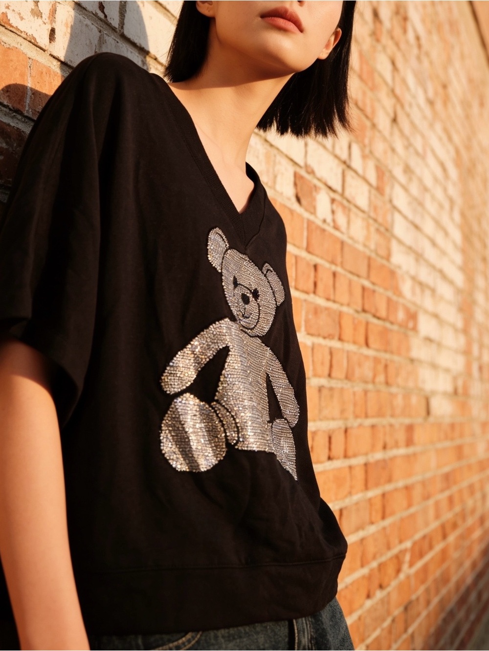 Lou & Grey Signature Soft Black Top with “Teddy Bear” Graphic Embellishments